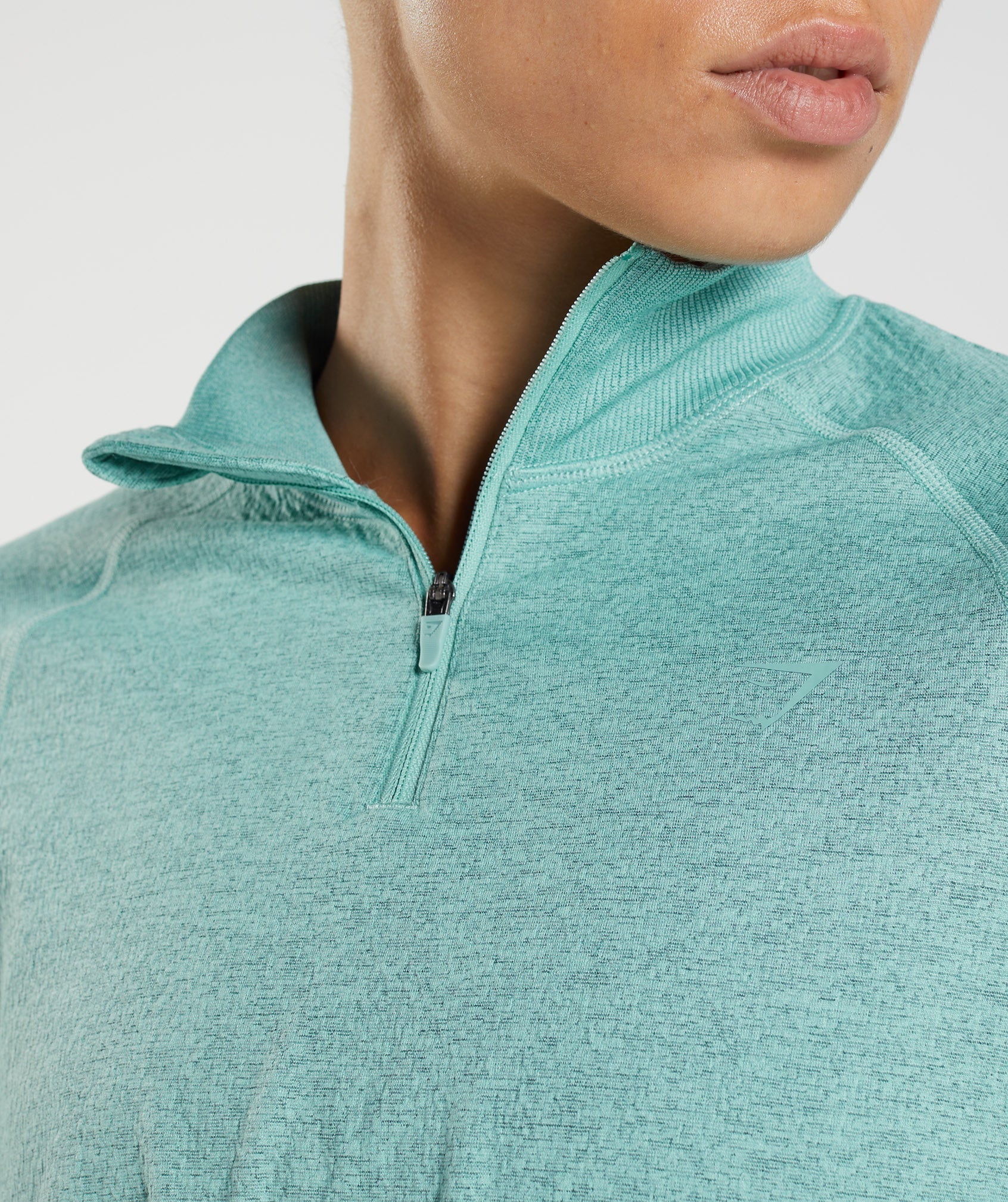 gymshark-315-long-sleeve-warmup-top-pearl-blue-winter-teal-marl-aw22