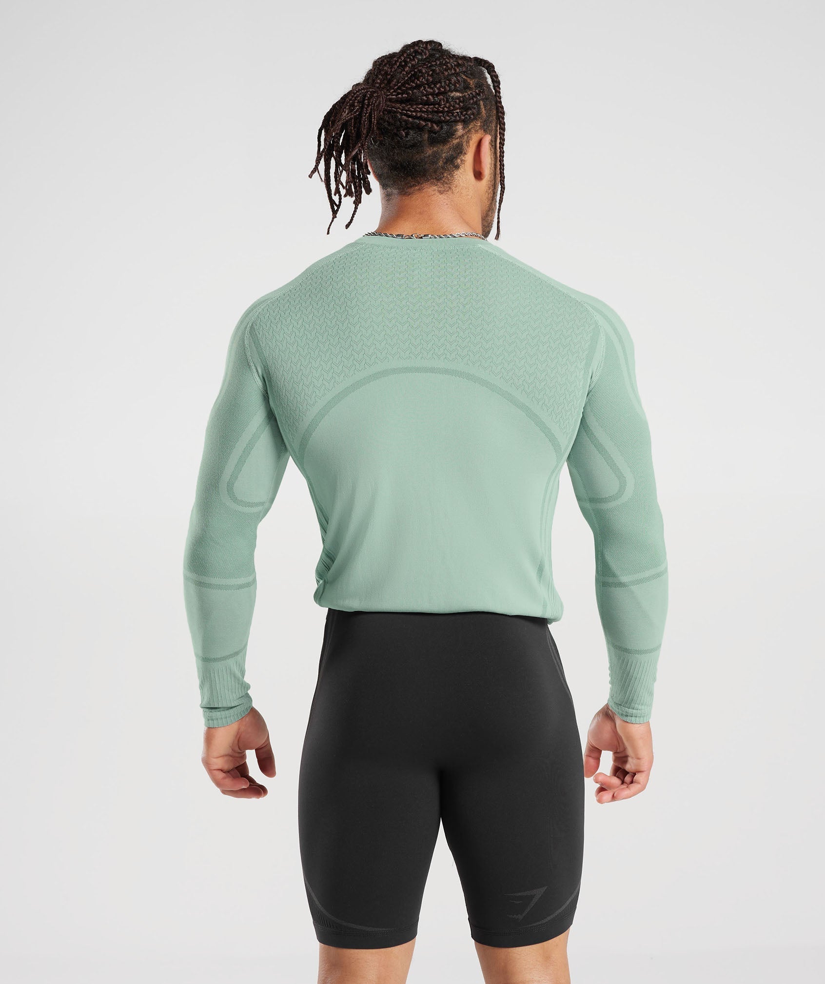 gymshark-315-seamless-long-sleeve-t-shirt-frost-teal-ink-teal-ss23
