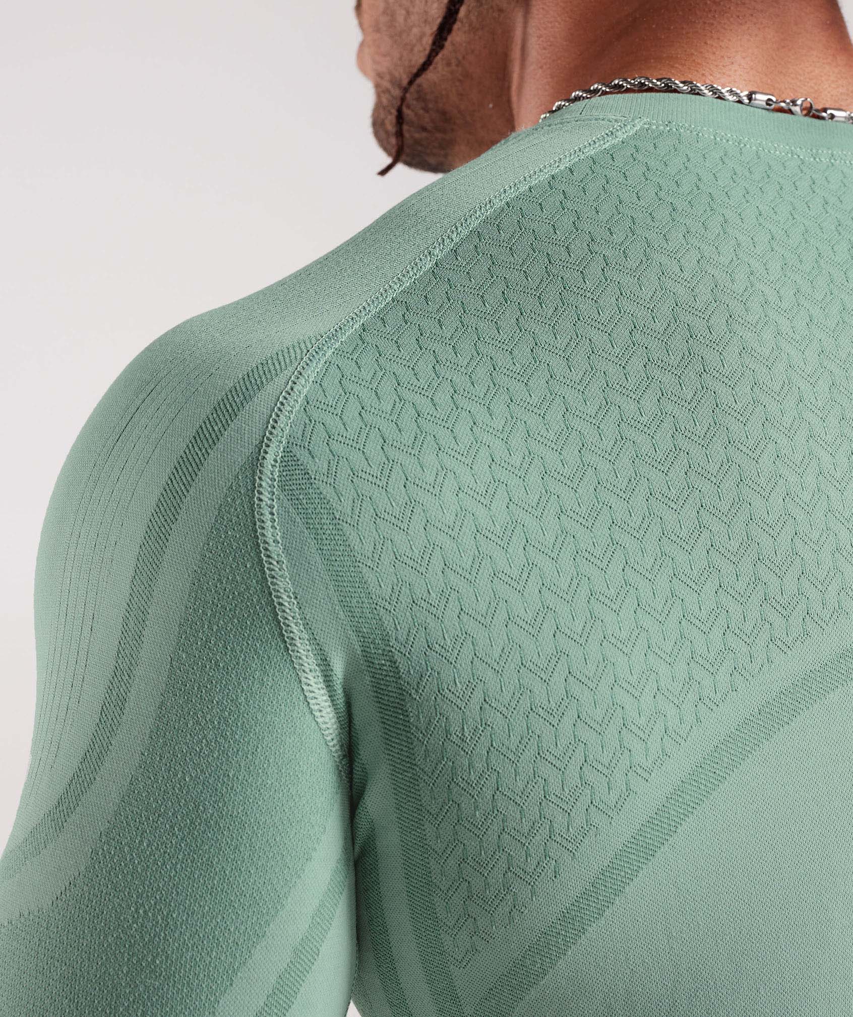 gymshark-315-seamless-long-sleeve-t-shirt-frost-teal-ink-teal-ss23