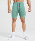 gymshark-315-seamless-shorts-ink-teal-jewel-green-ss23