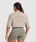 gymshark-66-washed-graphic-crop-top-linen-brown-ss25