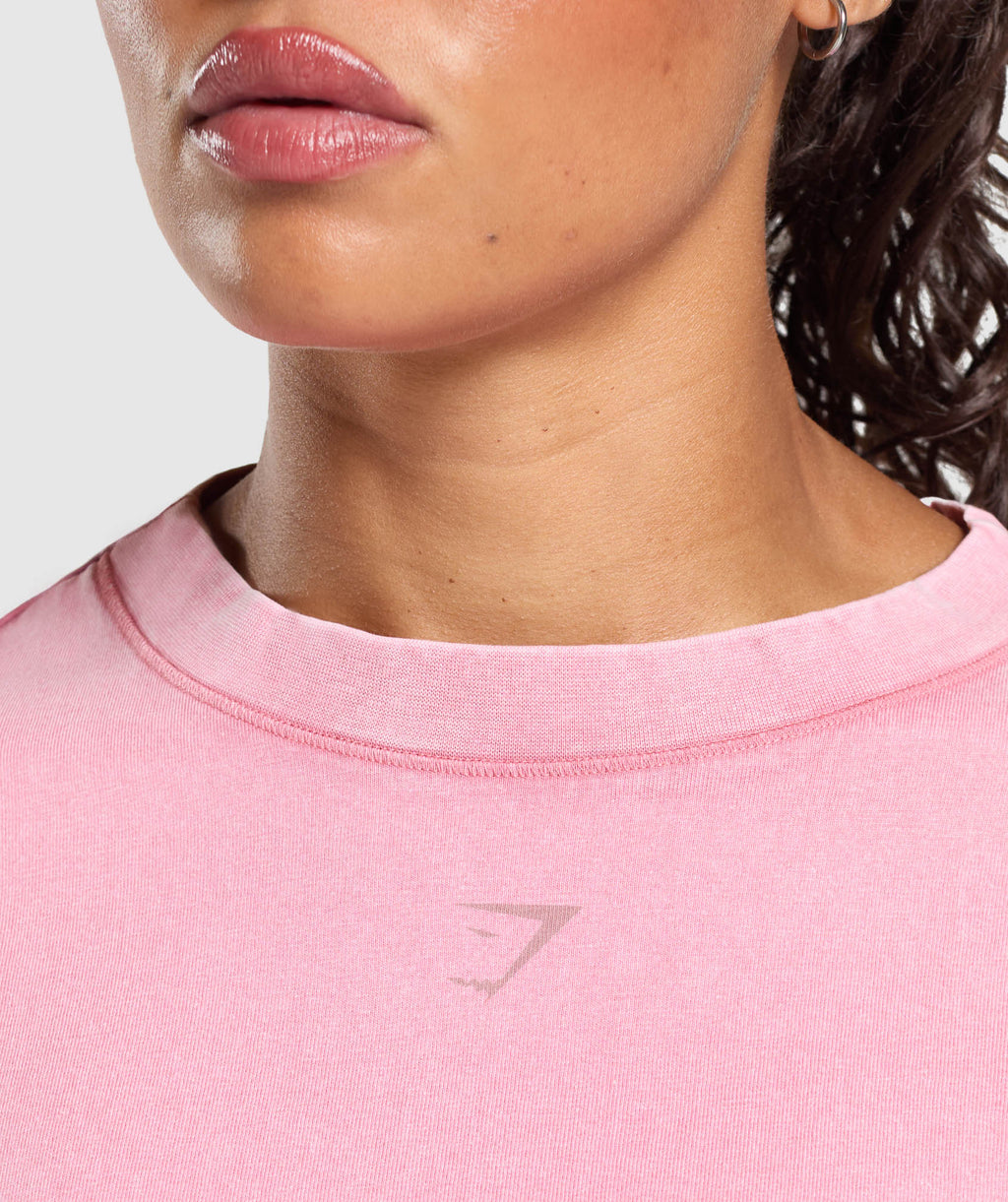 gymshark-gslc-washed-graphic-crop-top-sunset-pink-ss25