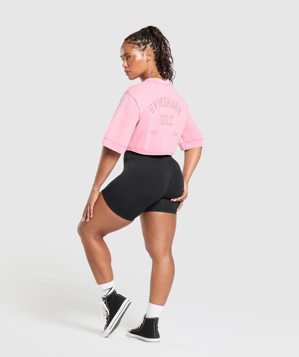 gymshark-gslc-washed-graphic-crop-top-sunset-pink-ss25