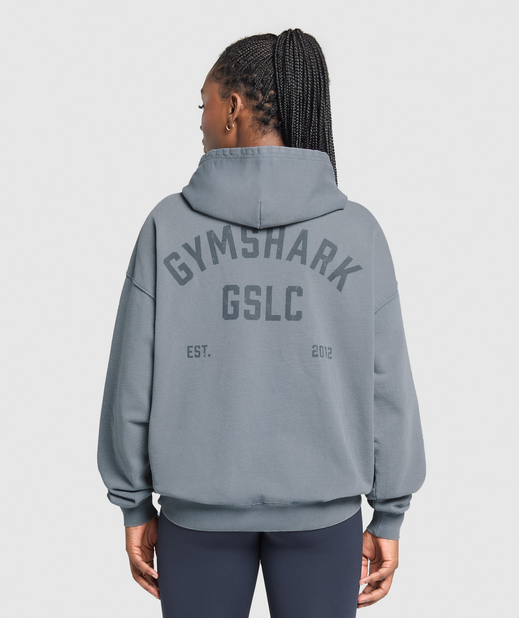gymshark-gslc-graphic-oversized-hoodie-iron-blue-ss25