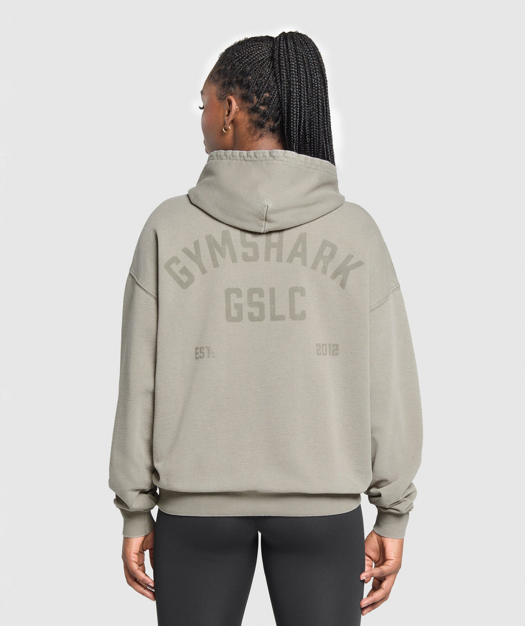 gymshark-gslc-graphic-oversized-hoodie-linen-brown-ss25