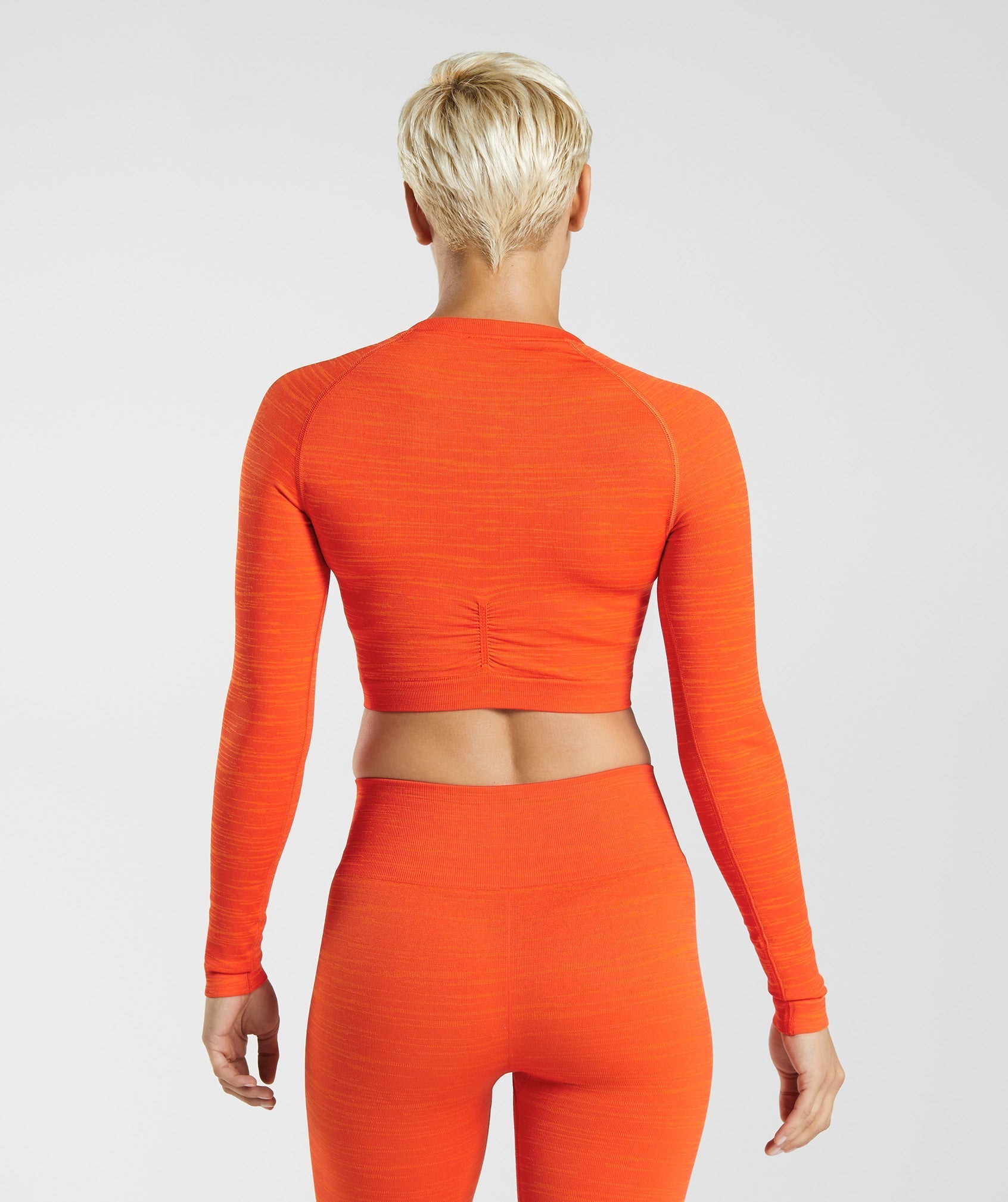 gymshark-adapt-marl-seamless-long-sleeve-crop-top-pepper-red-zesty-orange-aw22