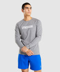 gymshark-apollo-long-sleeve-t-shirt-charcoal-marl-white-logo