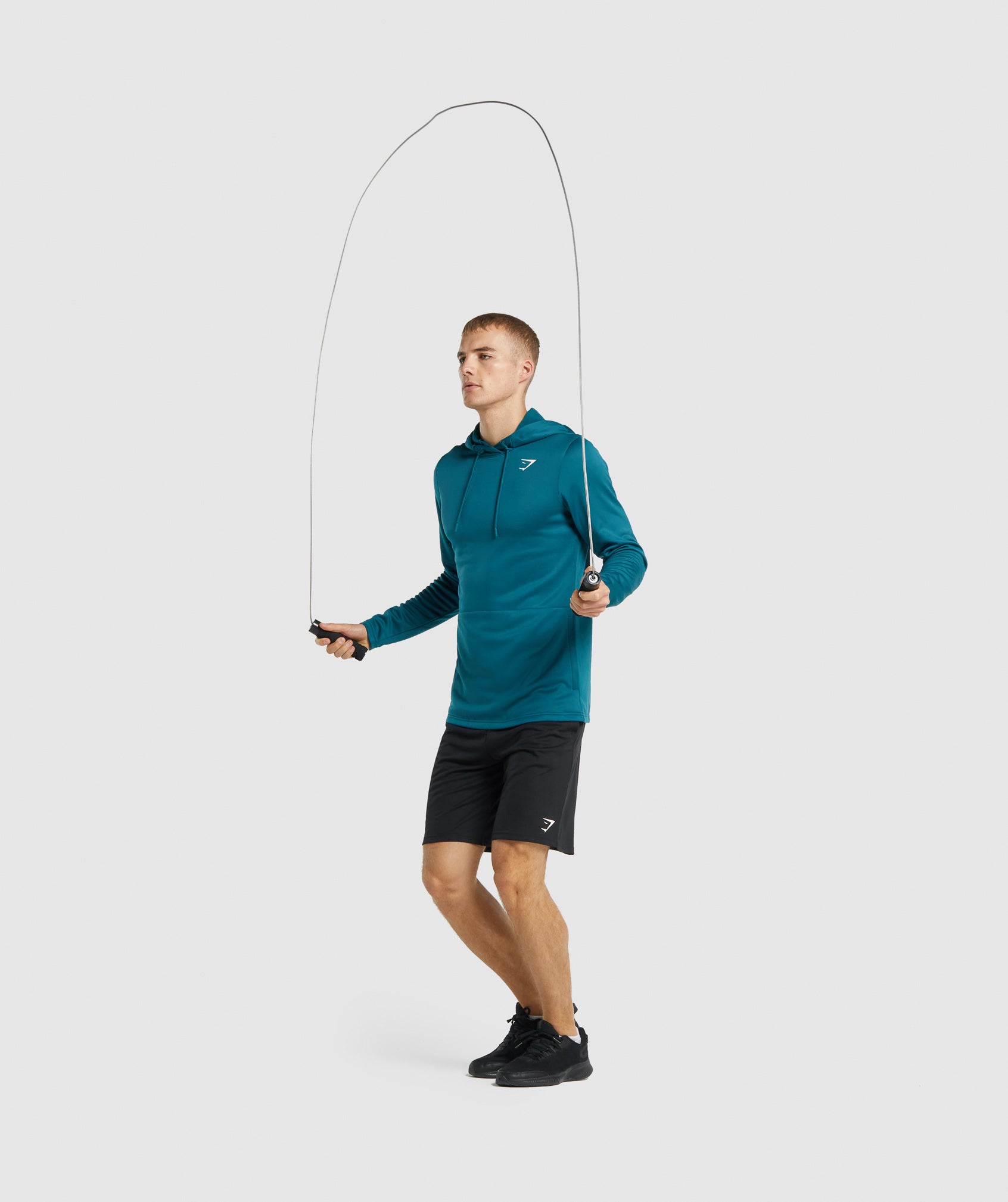 gymshark-arrival-hoodie-teal-logo