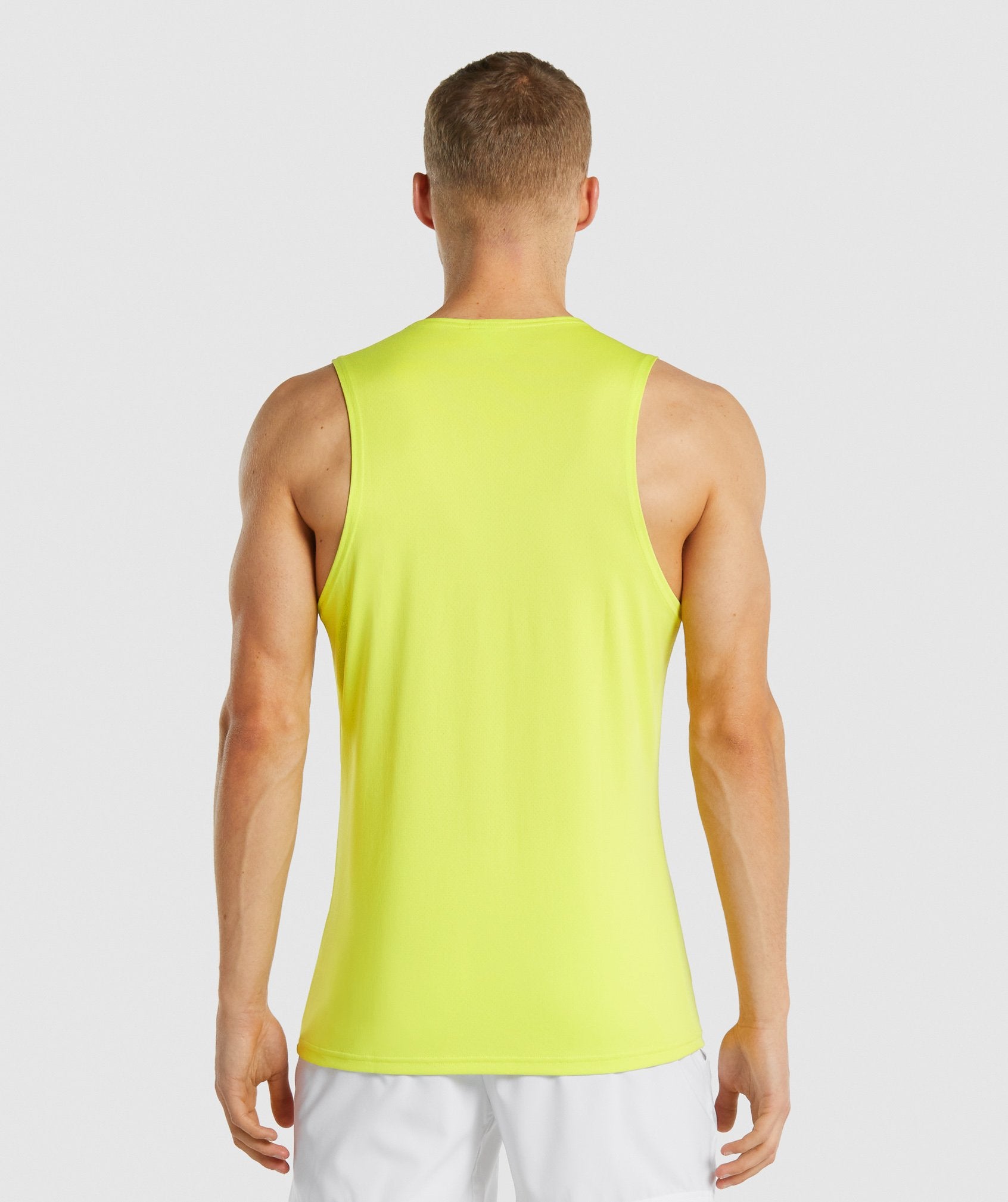 gymshark-arrival-tank-yellow-gsaw21