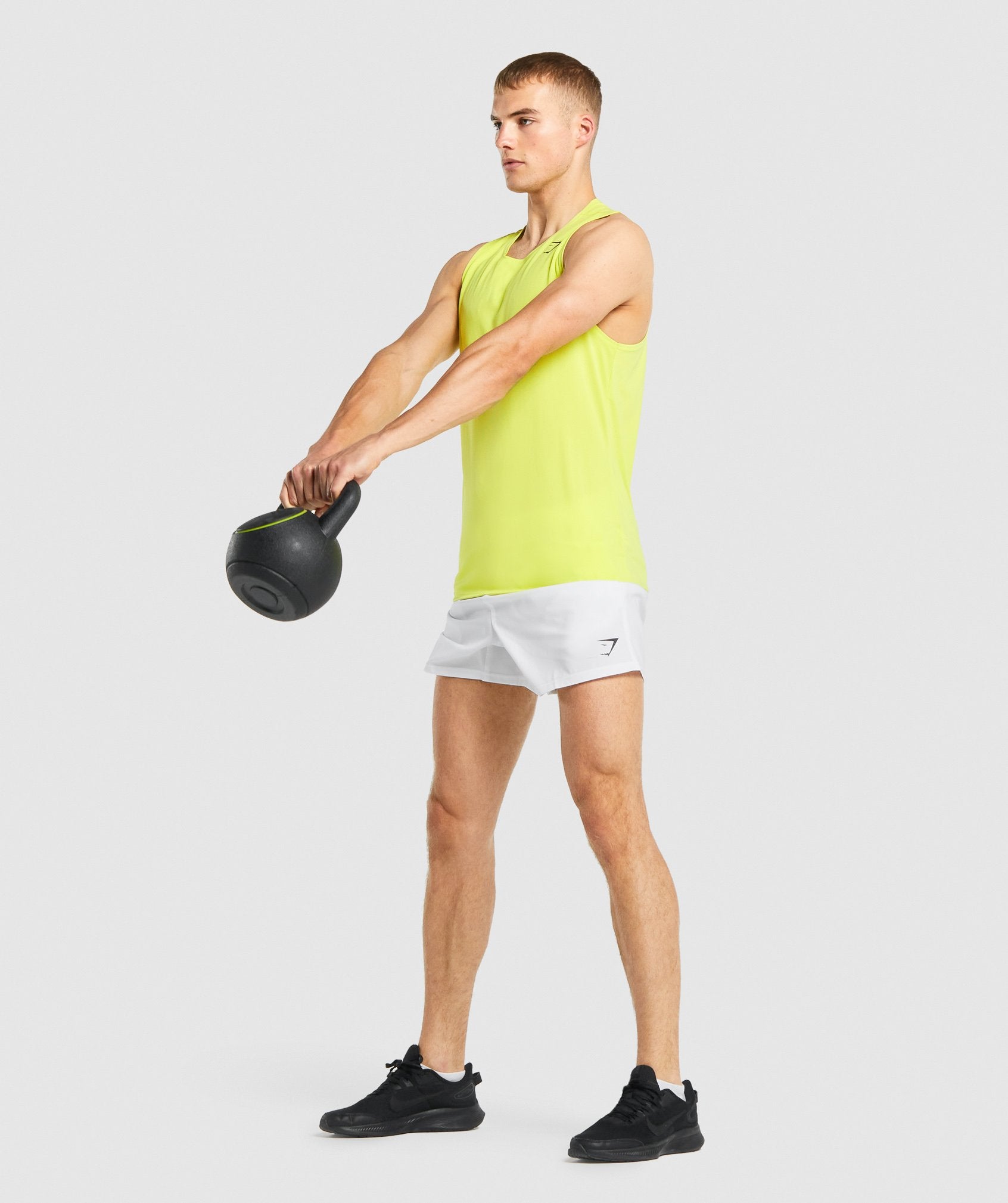 gymshark-arrival-tank-yellow-gsaw21