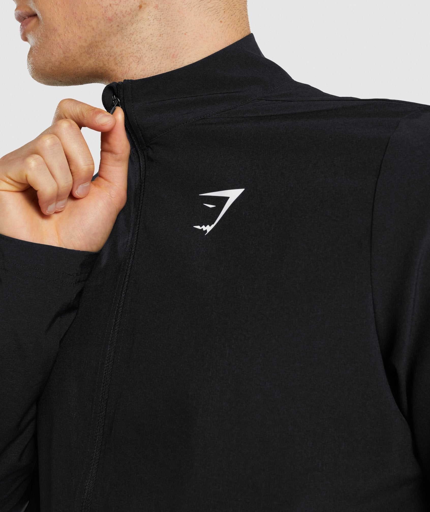 gymshark-arrival-woven-full-zip-jacket-black