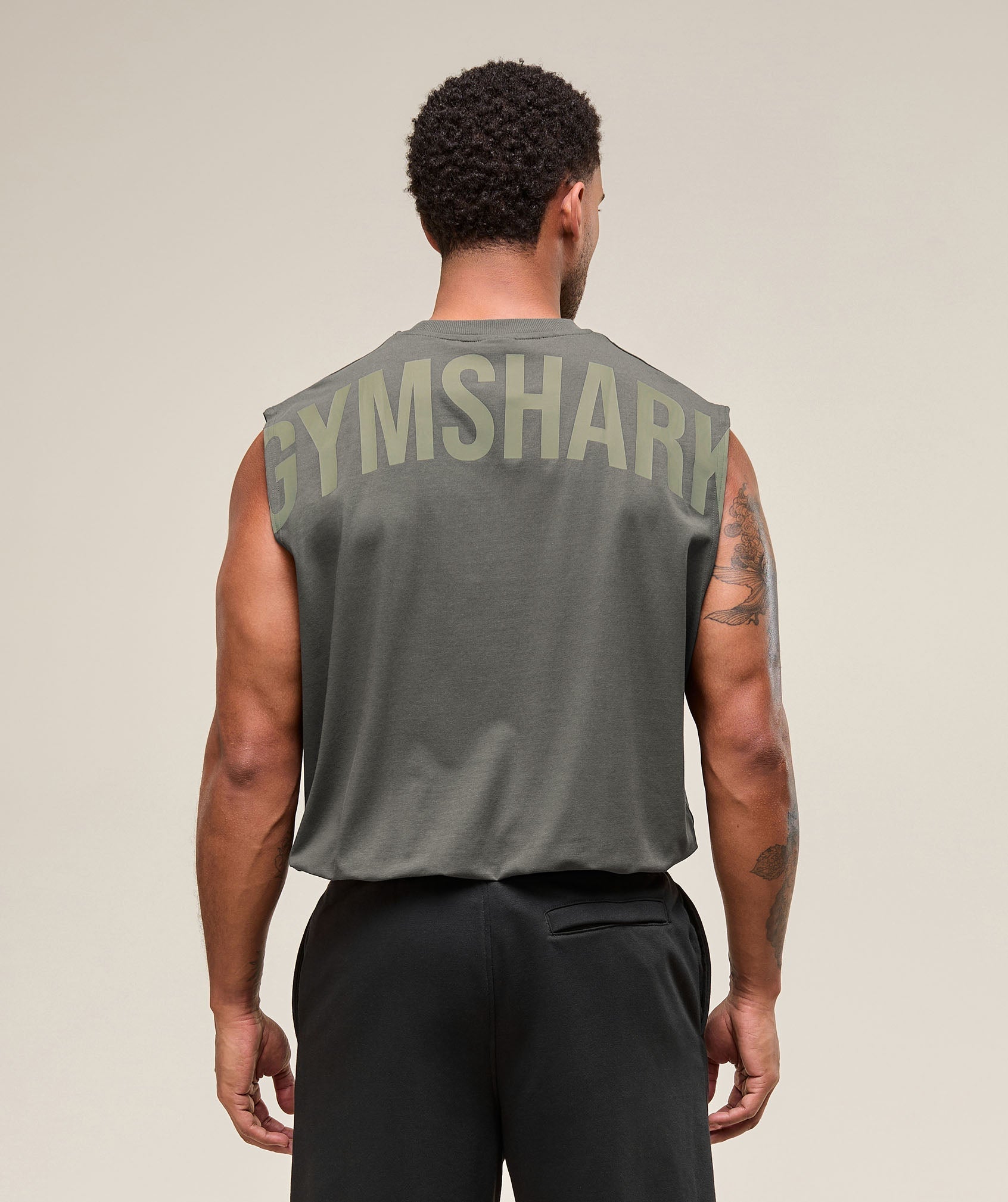 gymshark-power-cut-off-tank-strength-green-ss25