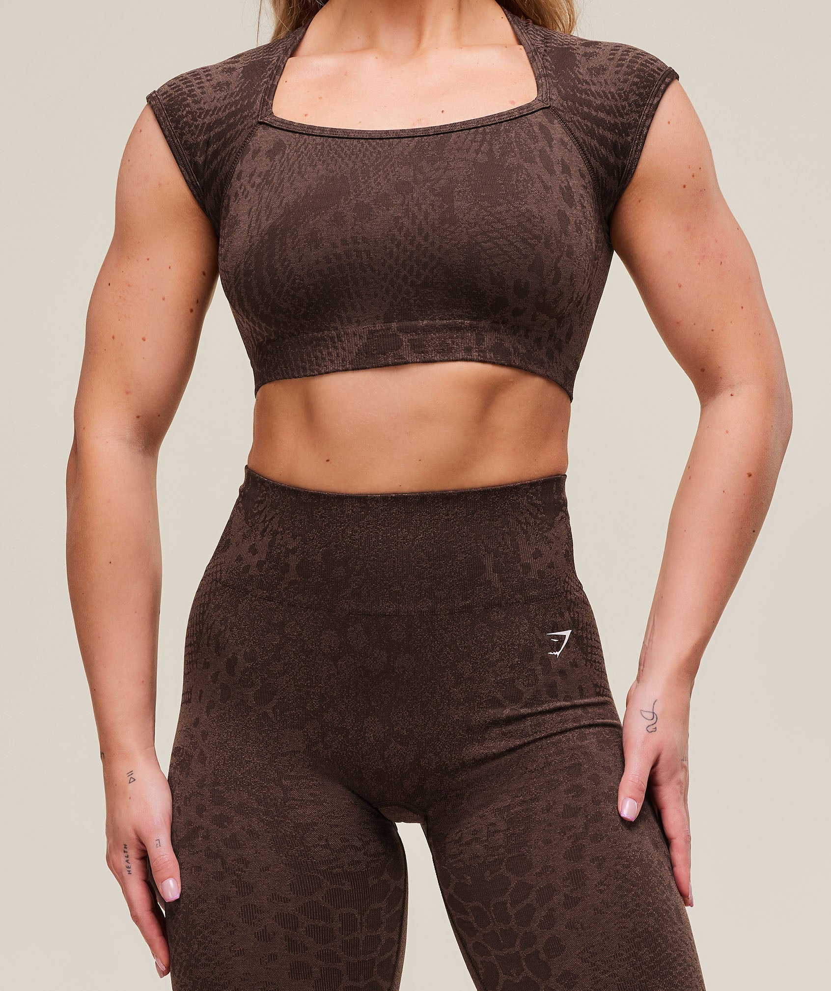 gymshark-adapt-x-whitney-animal-seamless-crop-top-brown-ss25