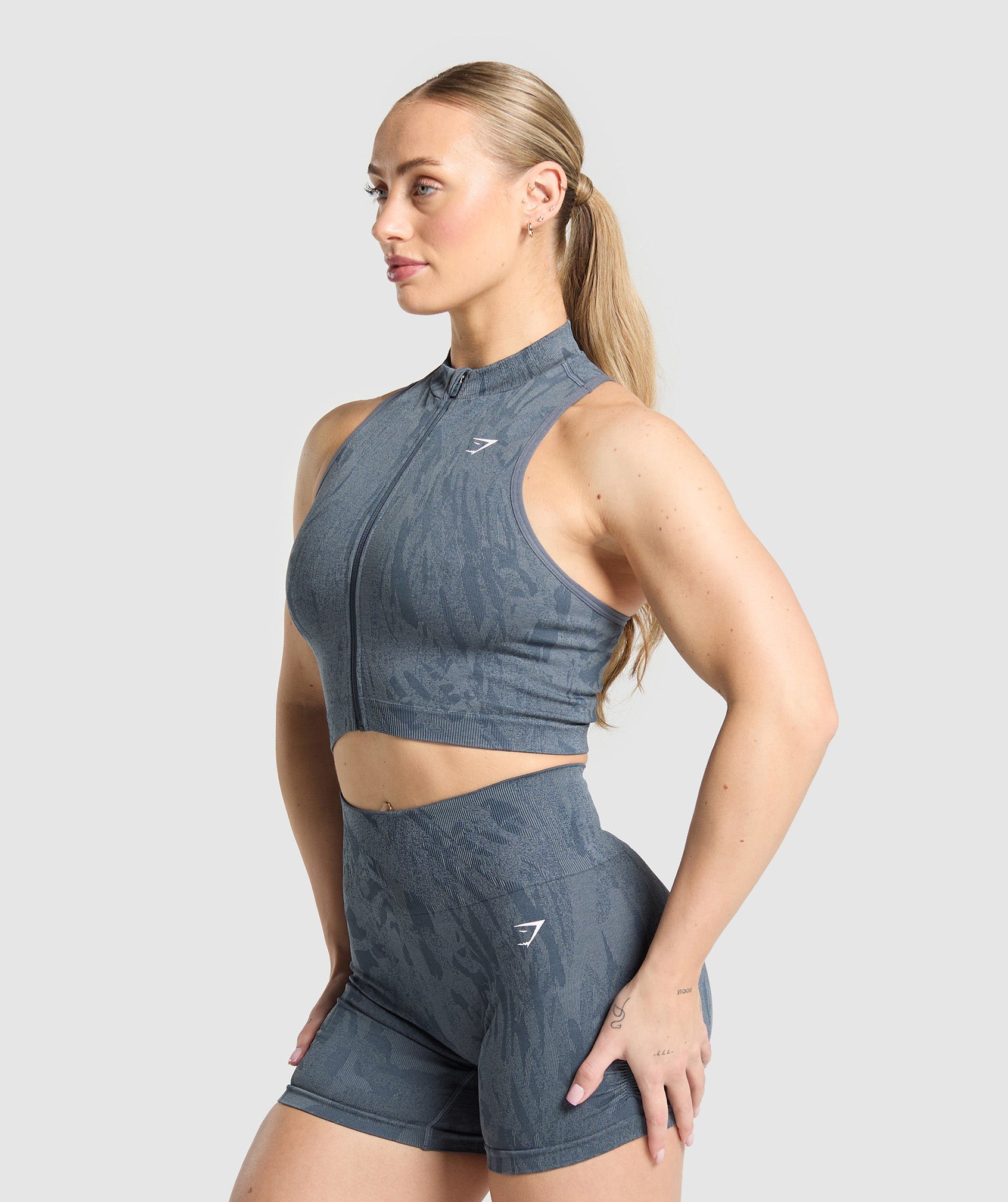 gymshark-adapt-camo-seamless-zip-up-crop-top-titanium-blue-denim-grey-ss25