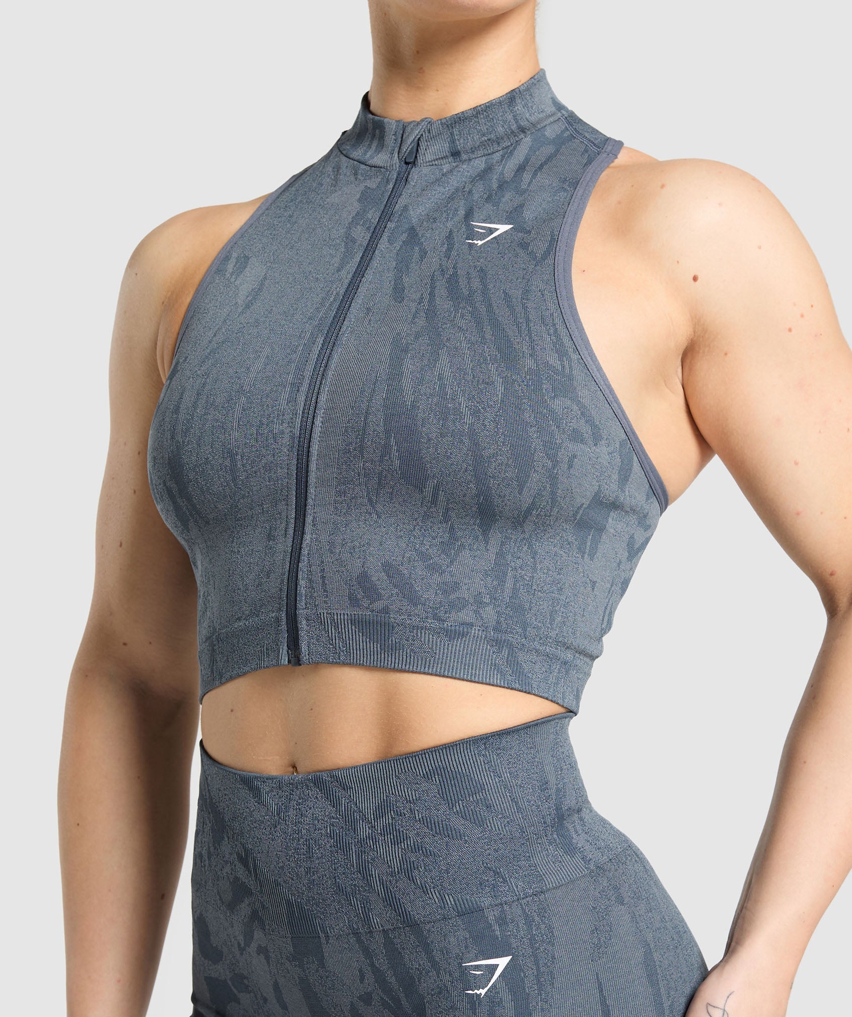 gymshark-adapt-camo-seamless-zip-up-crop-top-titanium-blue-denim-grey-ss25