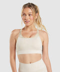 gymshark-adapt-fleck-seamless-sports-bra-mineral-coconut-white-ss22