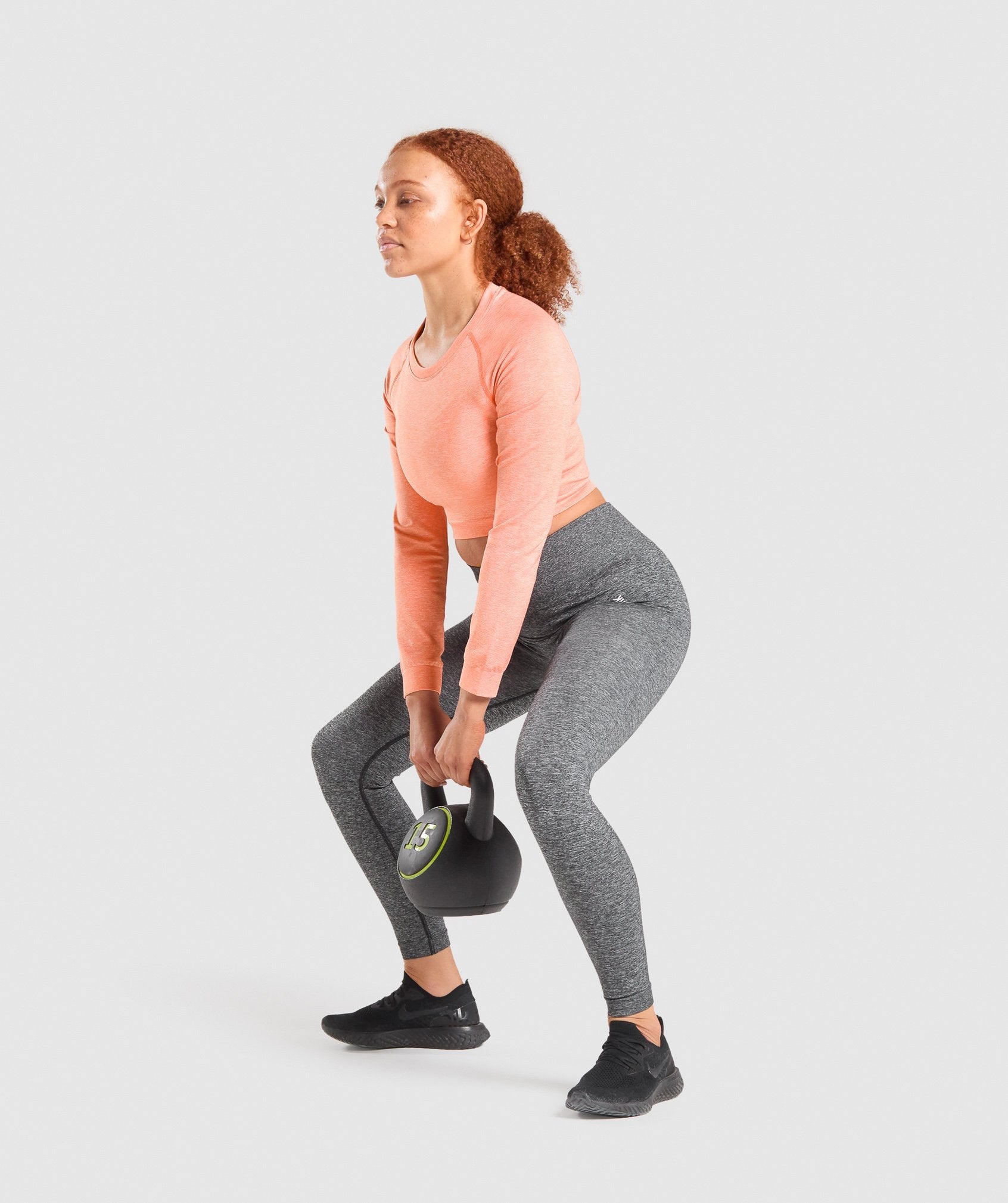gymshark-adapt-marl-seamless-long-sleeve-crop-top-orange