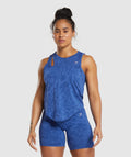 gymshark-adapt-safari-seamless-drop-arm-lifting-tank-wave-blue-iris-blue-ss24