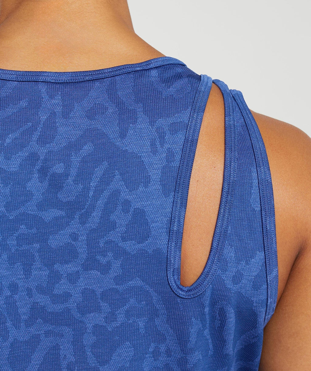 gymshark-adapt-safari-seamless-drop-arm-lifting-tank-wave-blue-iris-blue-ss24