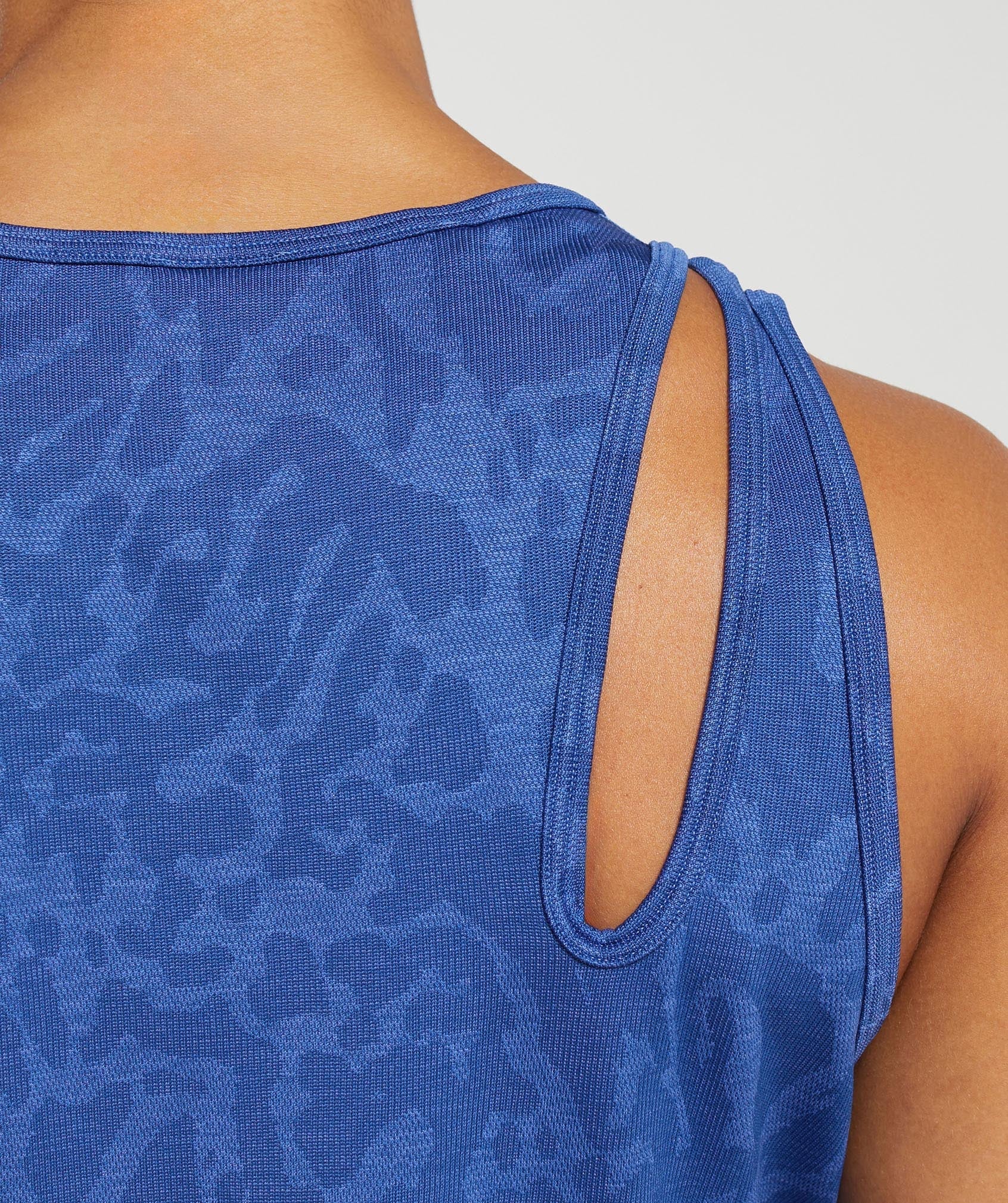 gymshark-adapt-safari-seamless-drop-arm-lifting-tank-wave-blue-iris-blue-ss24