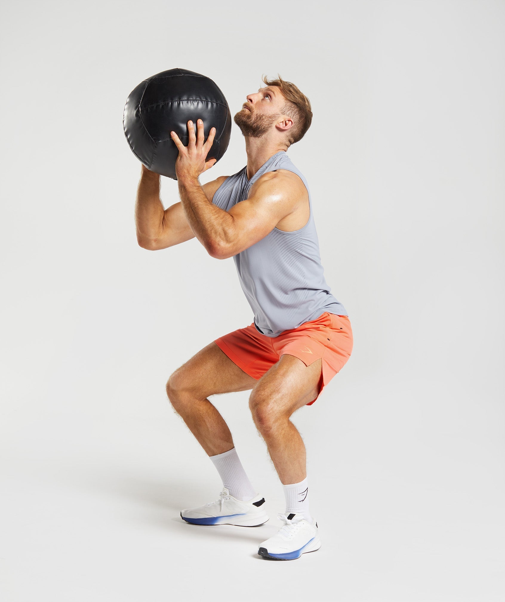 gymshark-apex-7-hybrid-shorts-solstice-orange-ss23