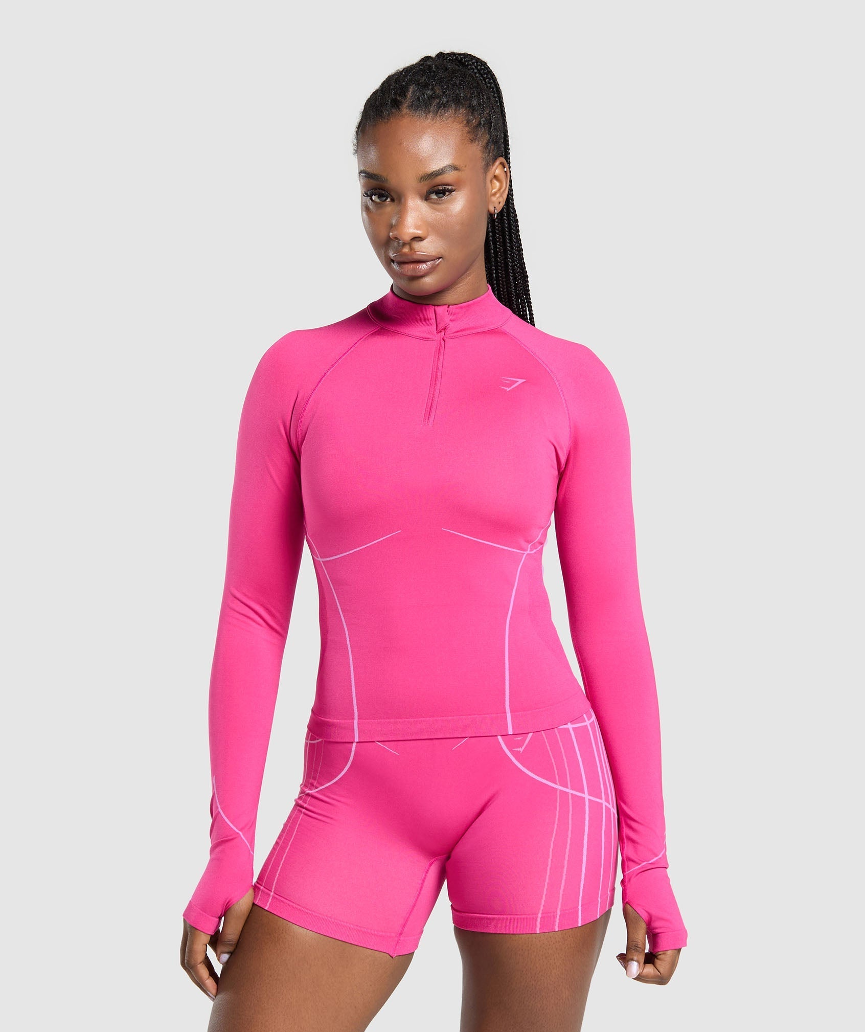 gymshark-apex-seamless-1-4-zip-pullover-valley-pink-sour-pink-ss24