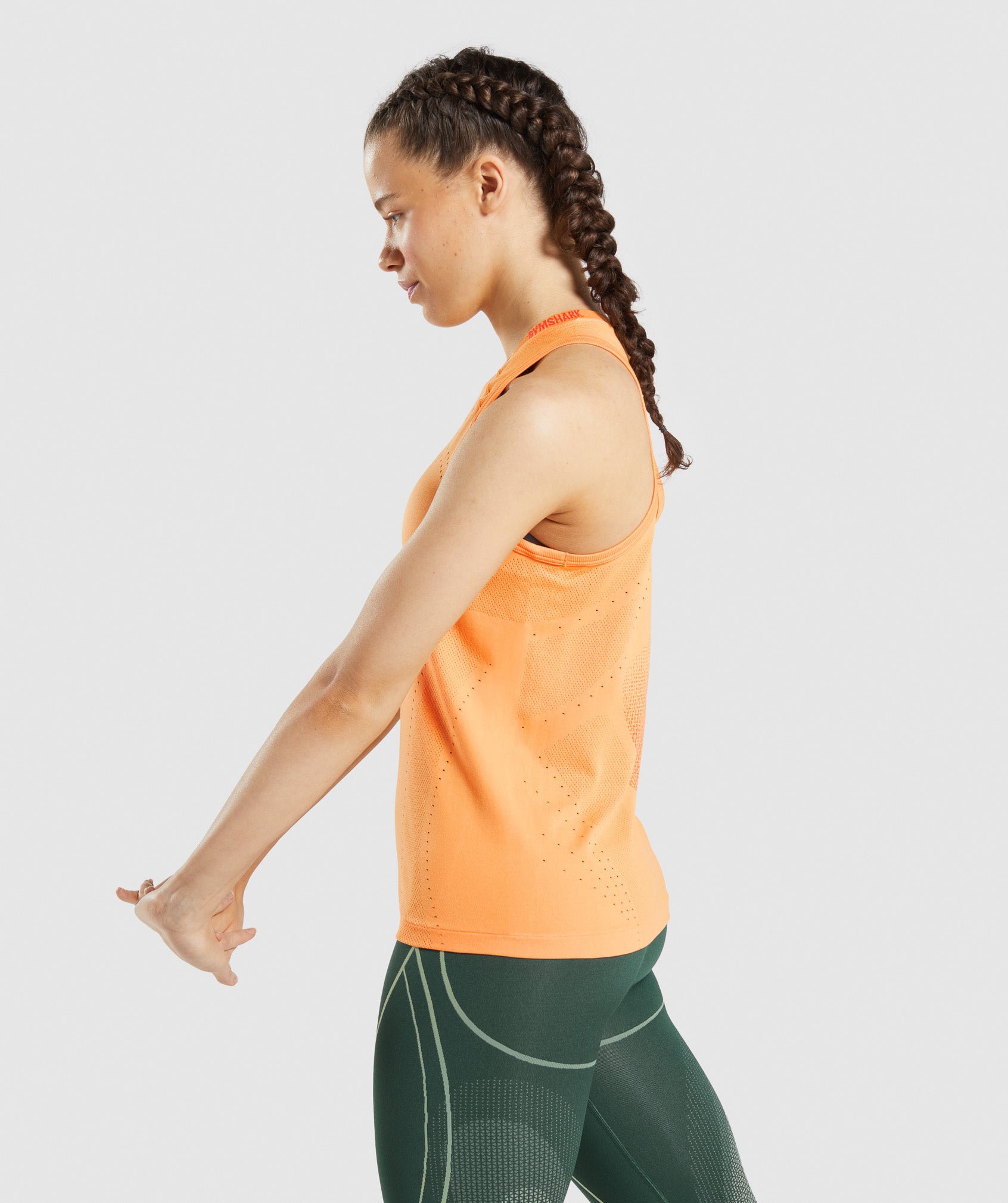 gymshark-apex-seamless-tank-apricot-orange-papaya-orange-ss22