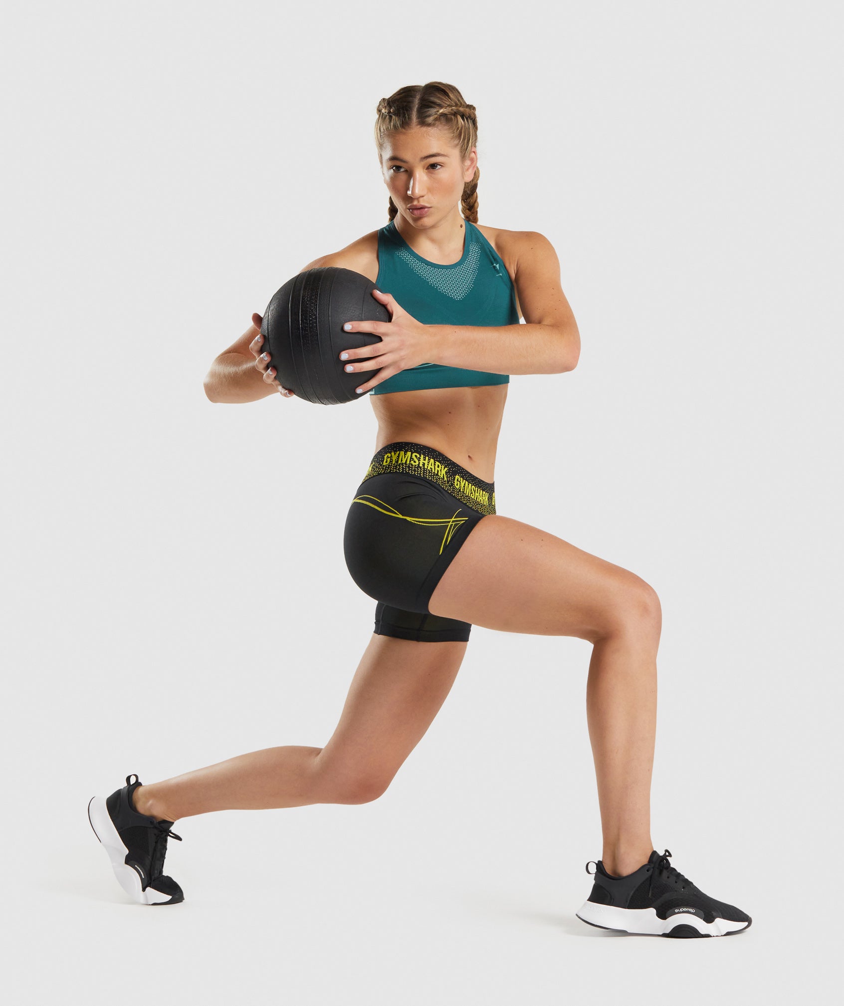 gymshark-apex-seamless-low-rise-shorts-black-yellow-aw21