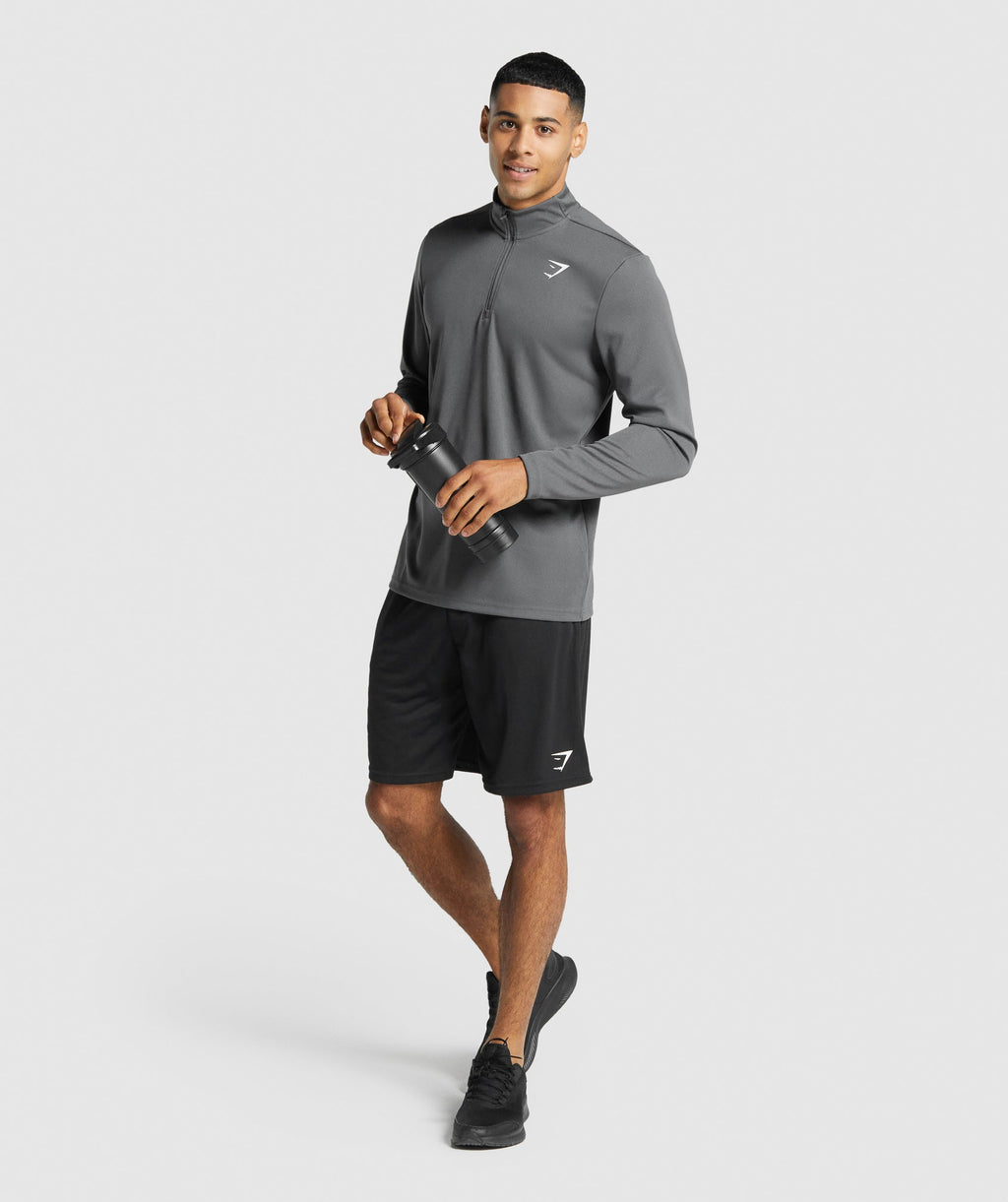 gymshark-arrival-1-4-zip-pullover-charcoal-logo