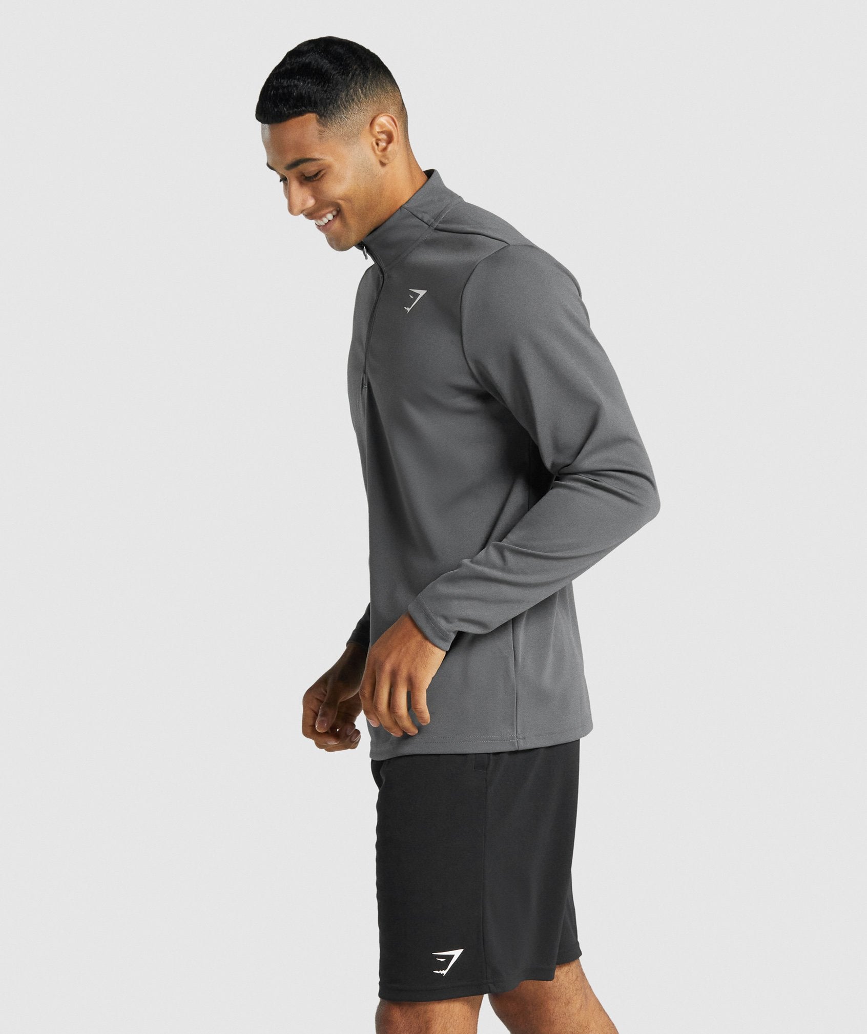 gymshark-arrival-1-4-zip-pullover-charcoal-logo