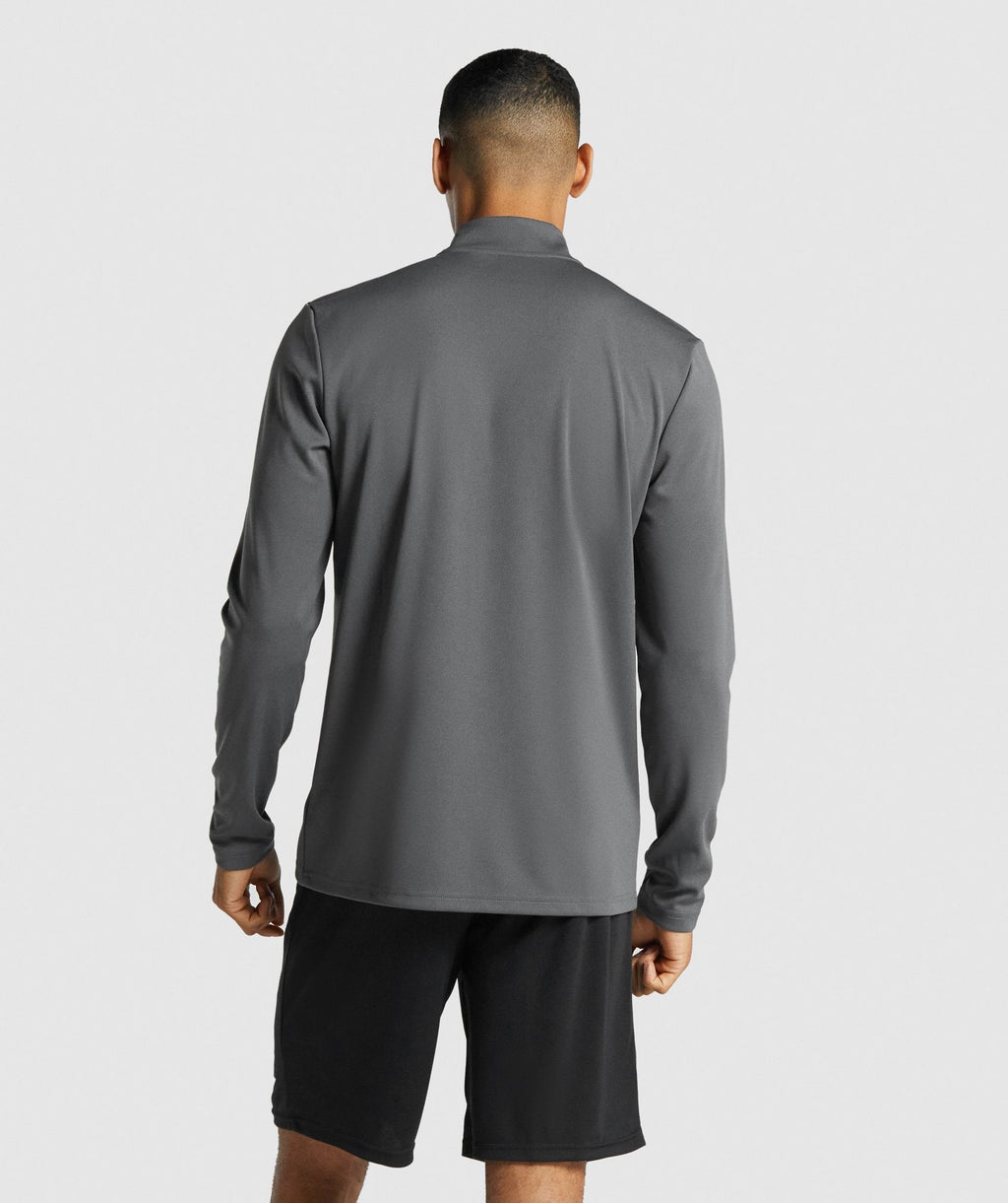gymshark-arrival-1-4-zip-pullover-charcoal-logo