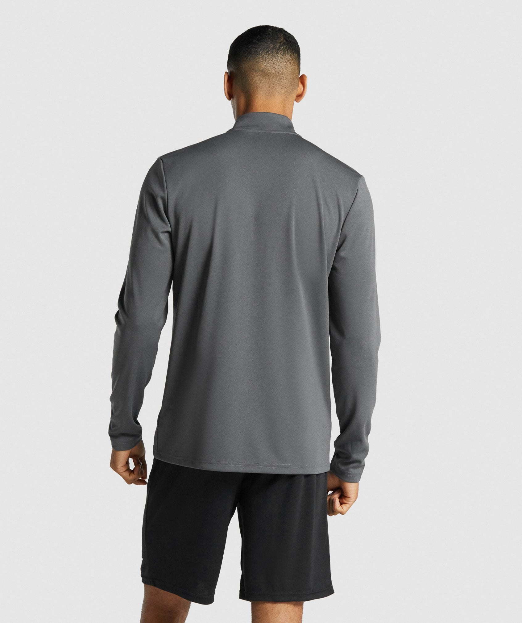 gymshark-arrival-1-4-zip-pullover-charcoal-logo