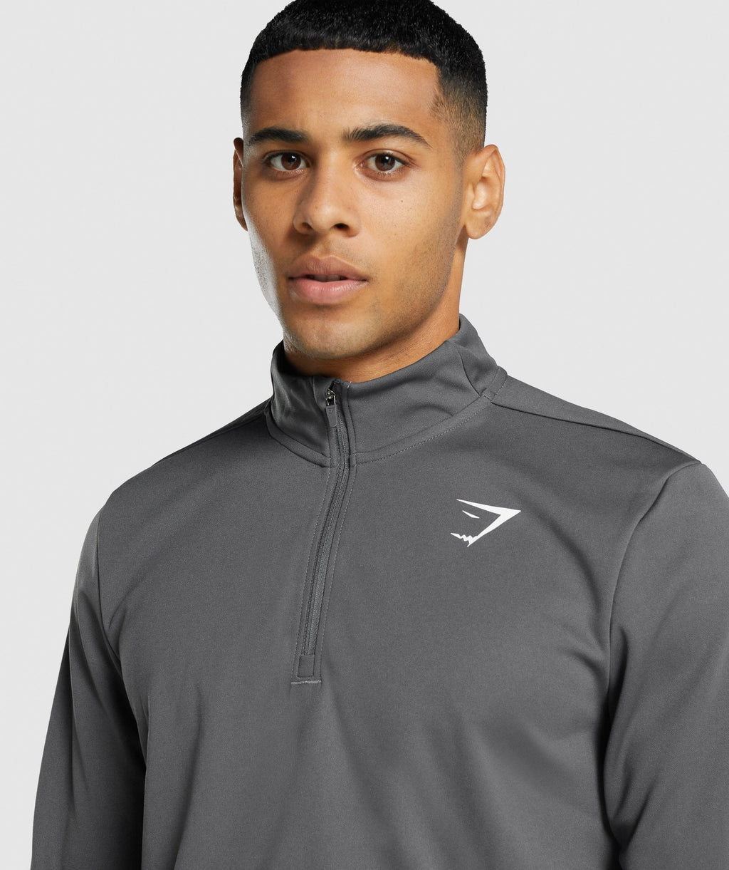 gymshark-arrival-1-4-zip-pullover-charcoal-logo