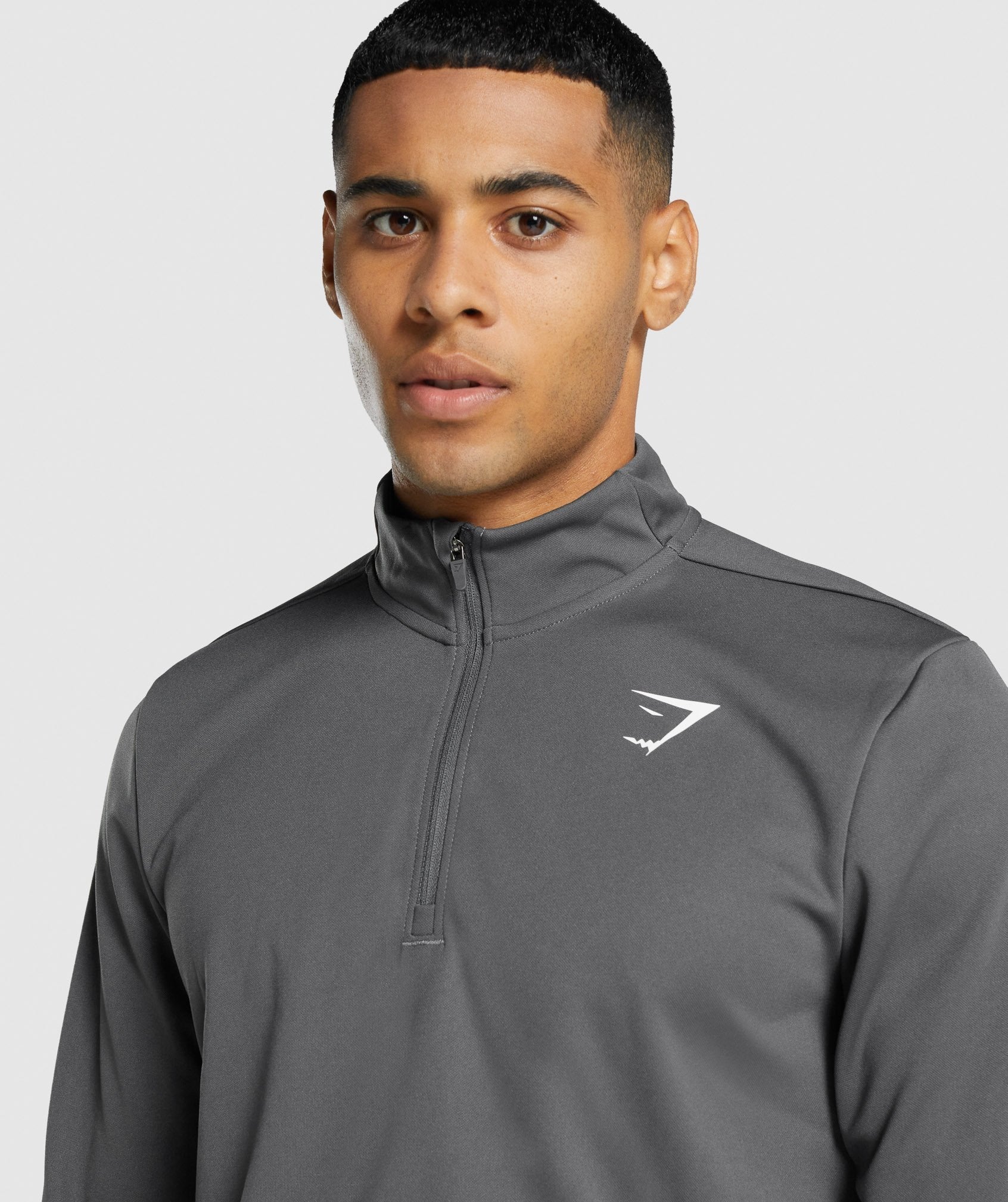 gymshark-arrival-1-4-zip-pullover-charcoal-logo