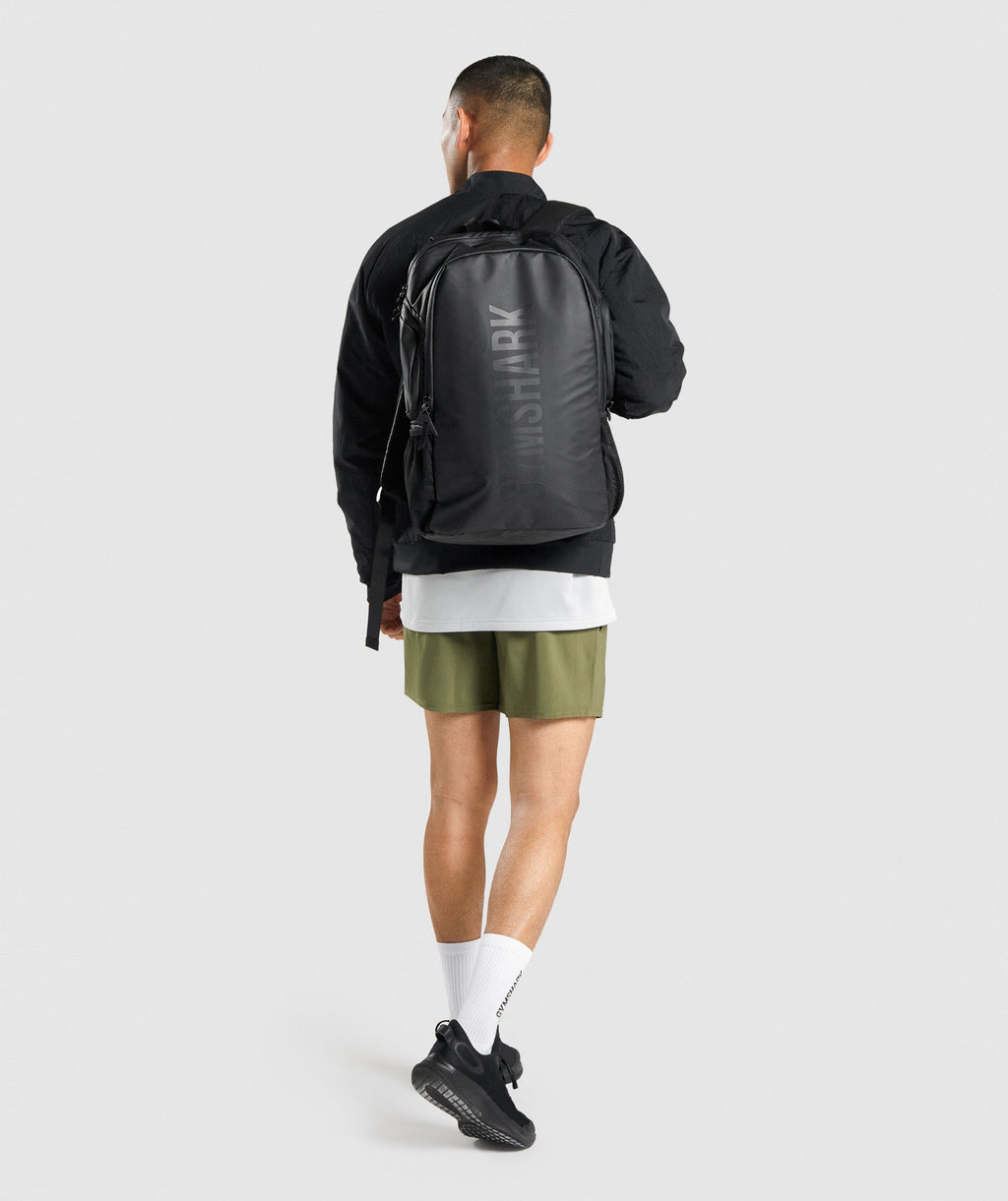gymshark-arrival-5-shorts-dark-green-white-logo