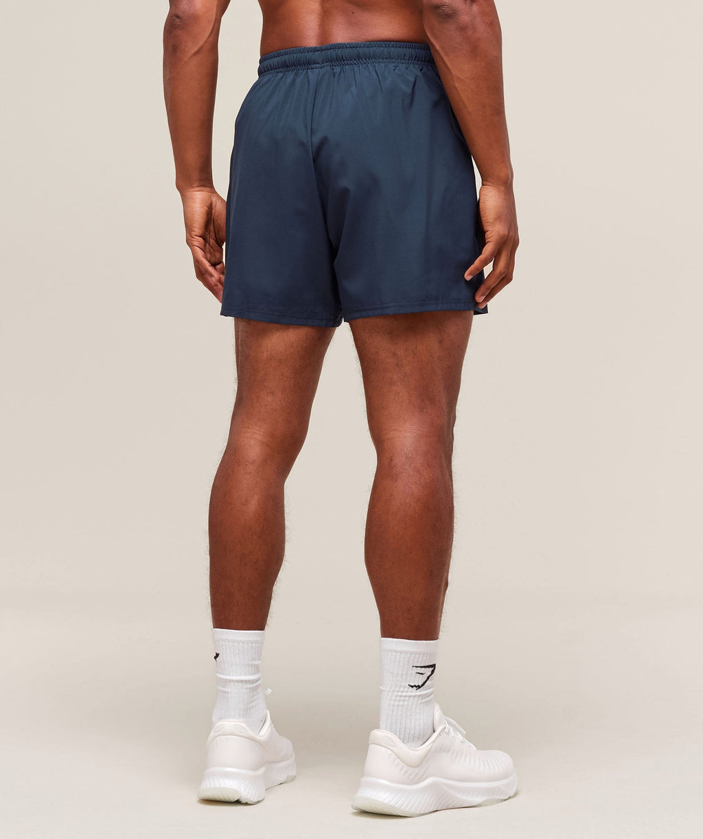 gymshark-arrival-5-shorts-navy-ss22