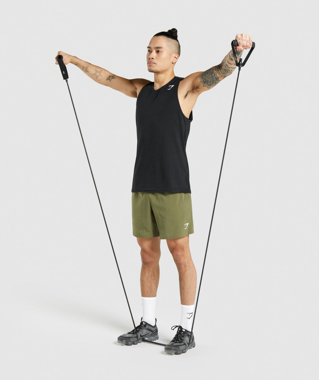 gymshark-arrival-shorts-dark-green-white-logo