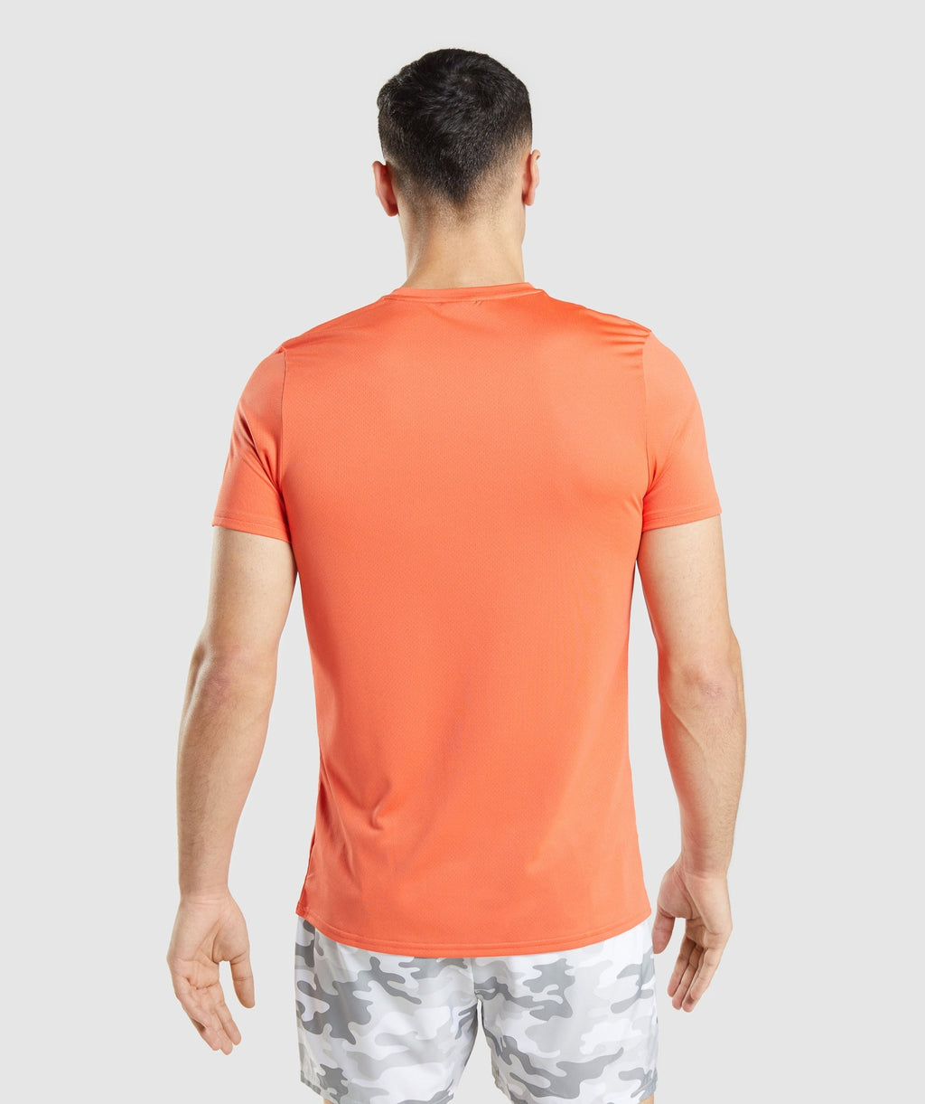 gymshark-arrival-graphic-t-shirt-papaya-orange-ss22