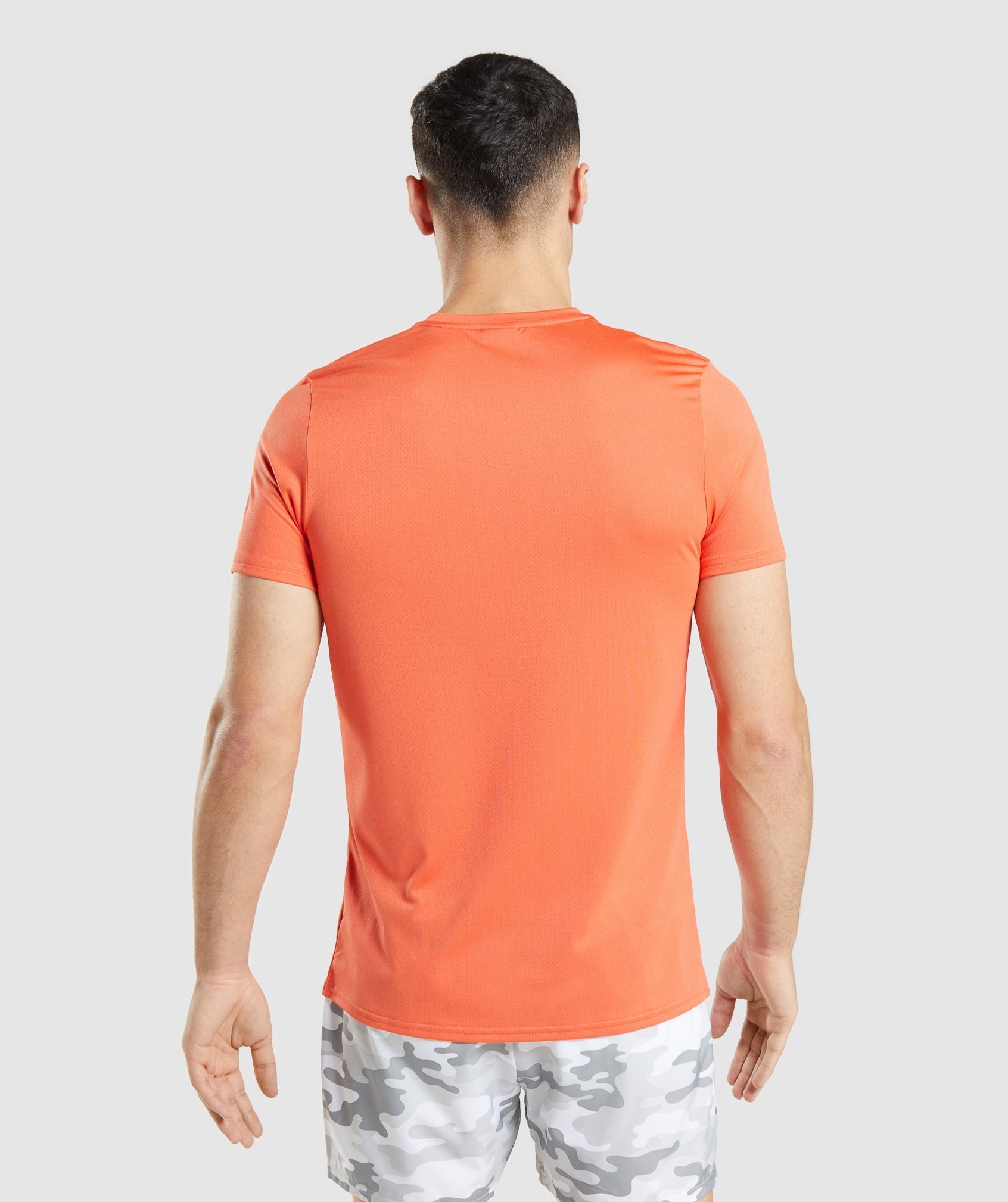 gymshark-arrival-graphic-t-shirt-papaya-orange-ss22