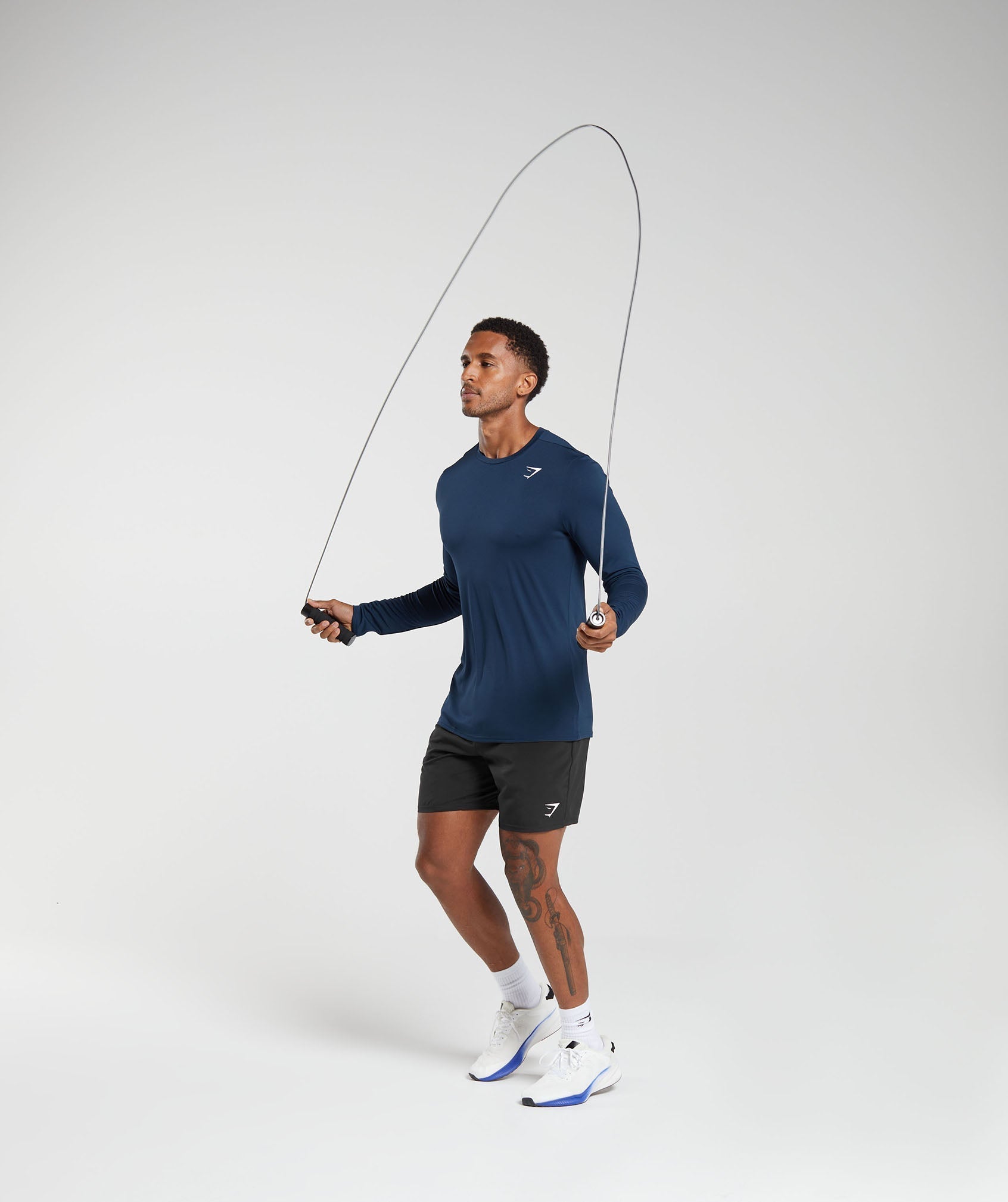 gymshark-arrival-long-sleeve-t-shirt-navy-ss22