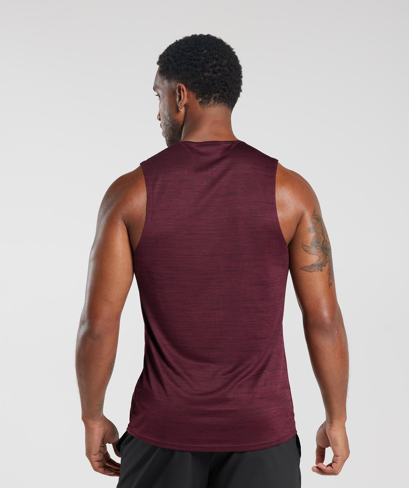 gymshark-arrival-marl-tank-plum-pink-plum-brown-marl-aw23