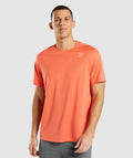 gymshark-arrival-regular-fit-t-shirt-papaya-orange-ss22