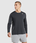 gymshark-arrival-seamless-long-sleeve-t-shirt-black-marl-aw21