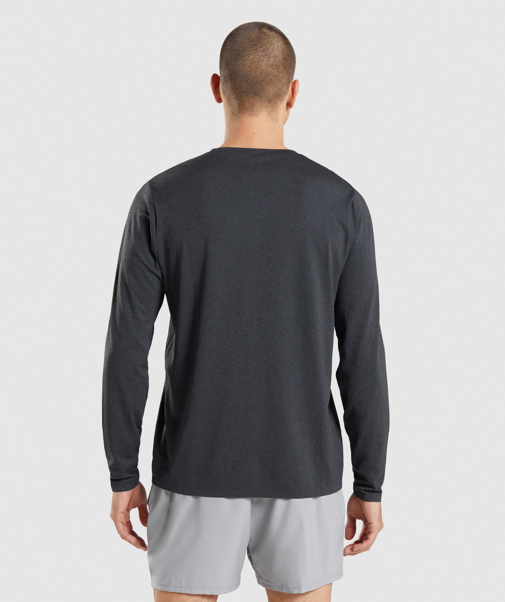 gymshark-arrival-seamless-long-sleeve-t-shirt-black-marl-aw21