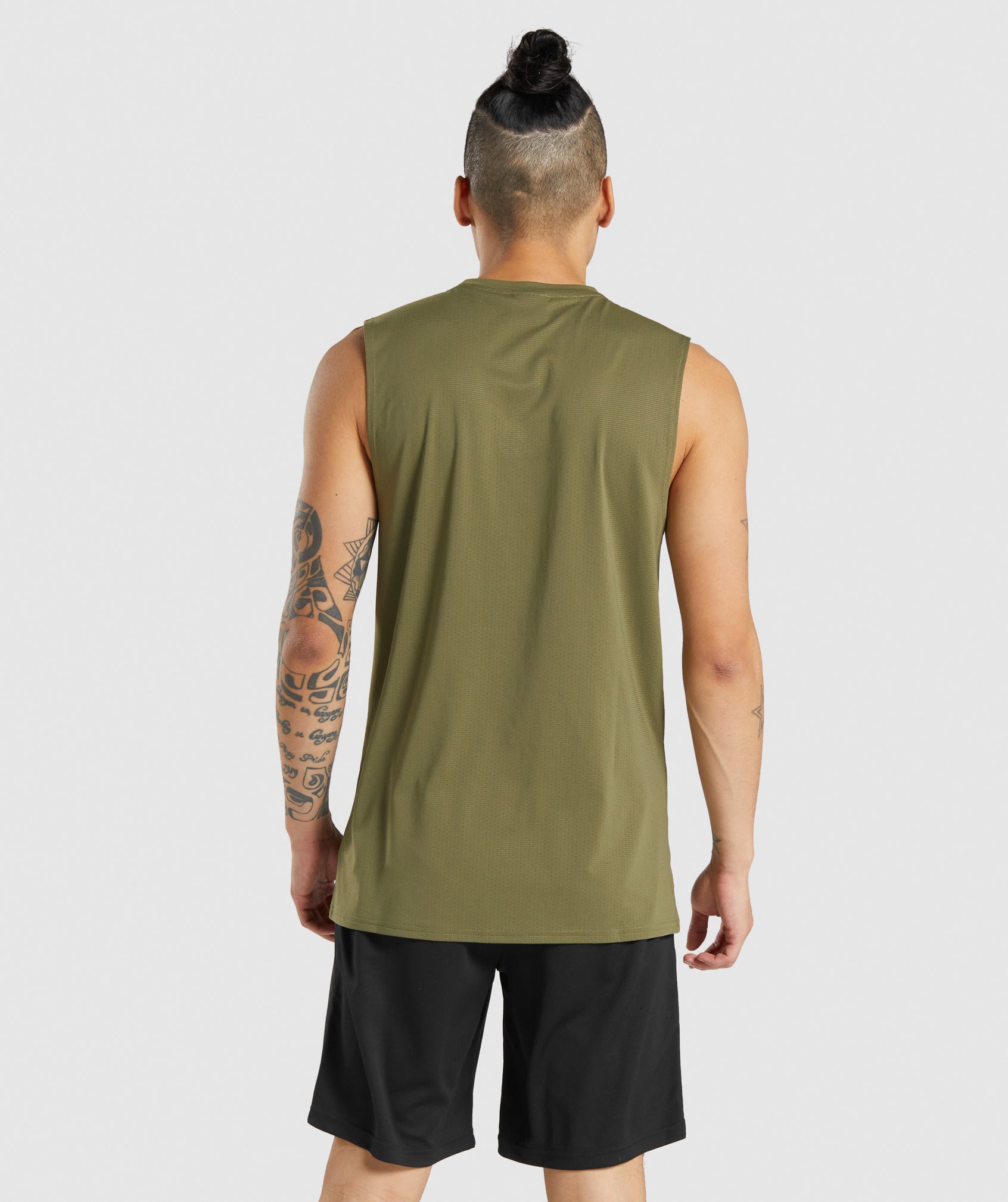gymshark-arrival-sleeveless-tee-dark-green