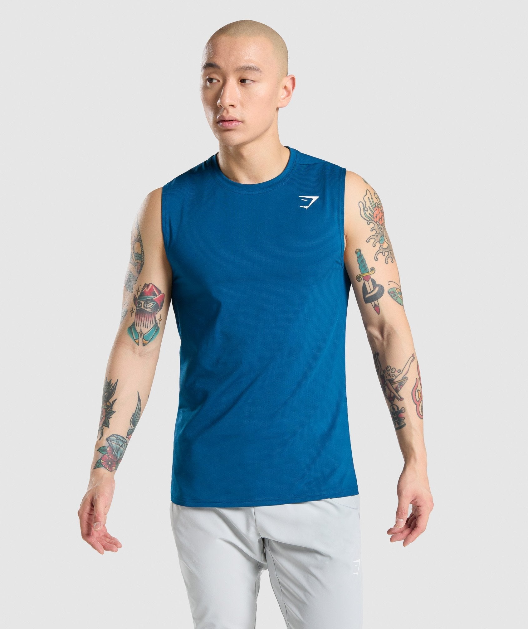 gymshark-arrival-sleeveless-tee-petrol-blue-aw21