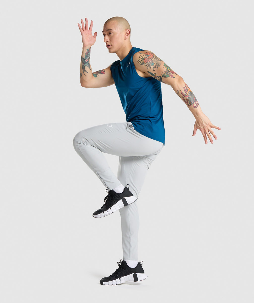 gymshark-arrival-sleeveless-tee-petrol-blue-aw21