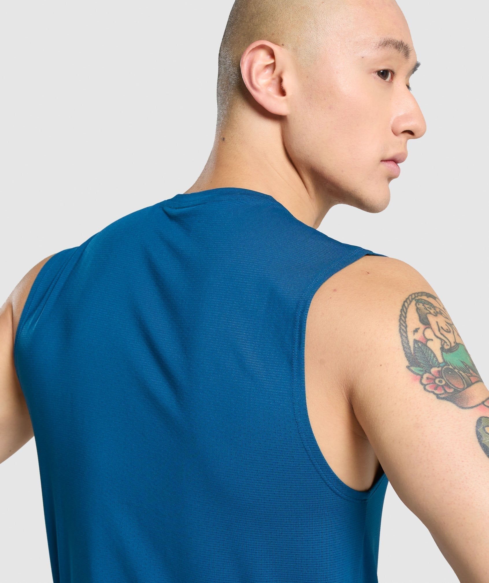 gymshark-arrival-sleeveless-tee-petrol-blue-aw21