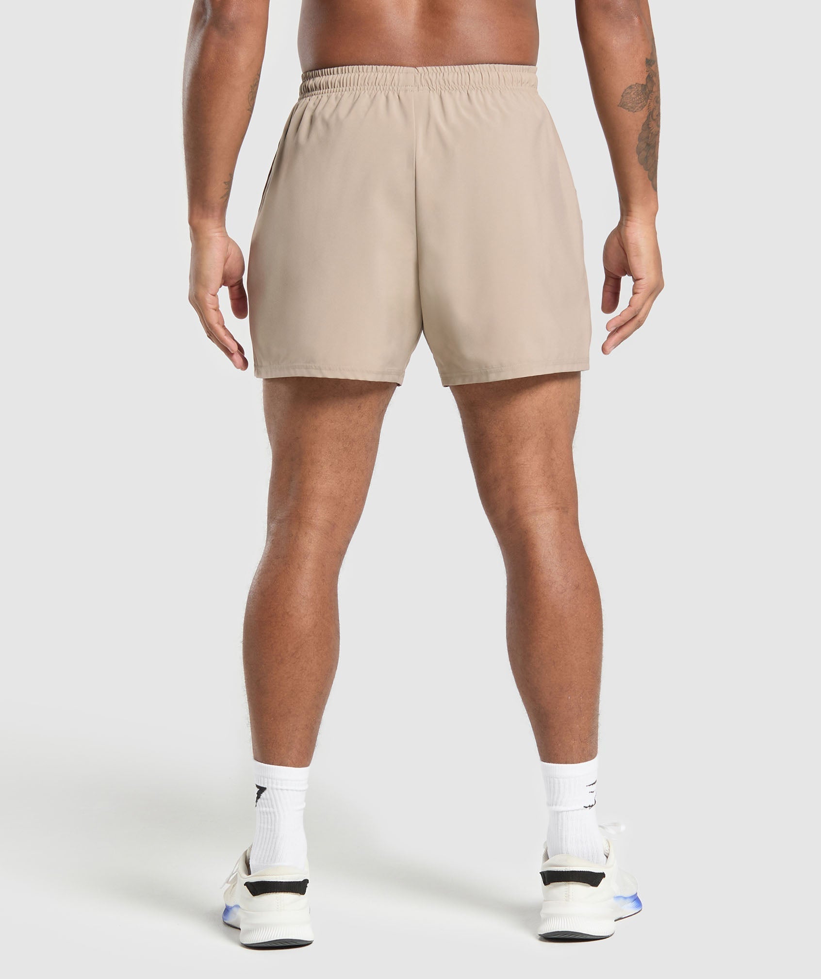 gymshark-arrival-5-shorts-cement-brown-ss25