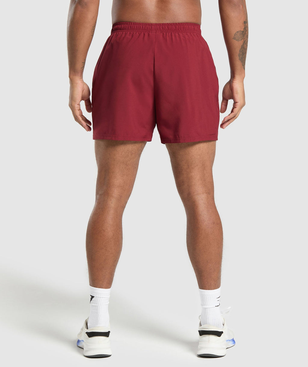 gymshark-arrival-5-shorts-sets-red-ss25